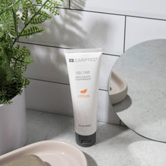 Citrus-flavored CariFree Gel 1100 adjacent to toothbrush