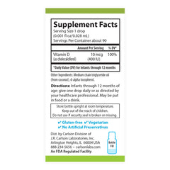 Dropper dispensing vitamin D3 into a bottle