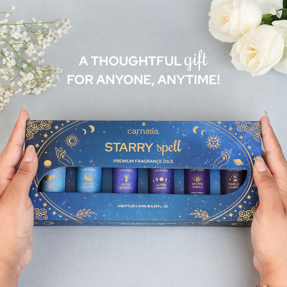 Close-up of Starry Spell fragrance oil bottle in gift box