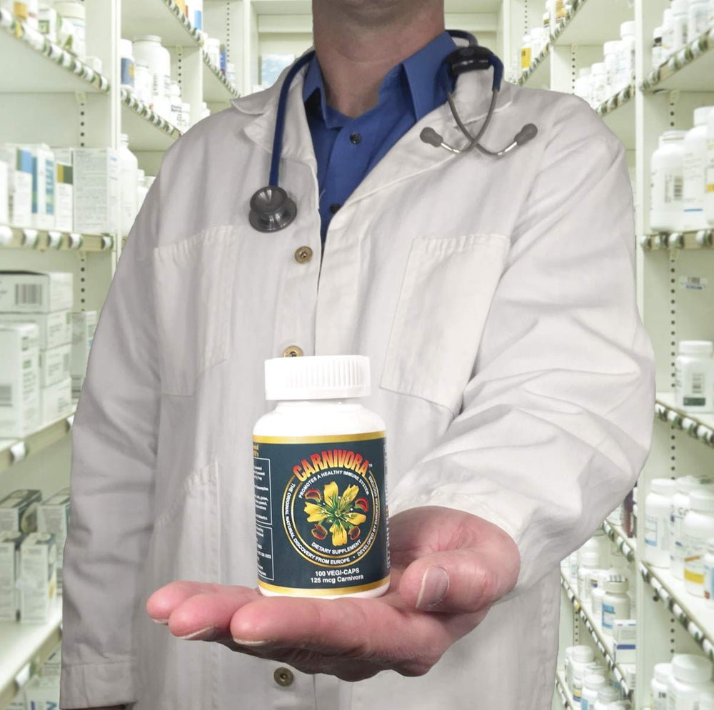 Carnivora Vegi-Caps capsules being poured from bottle into hand