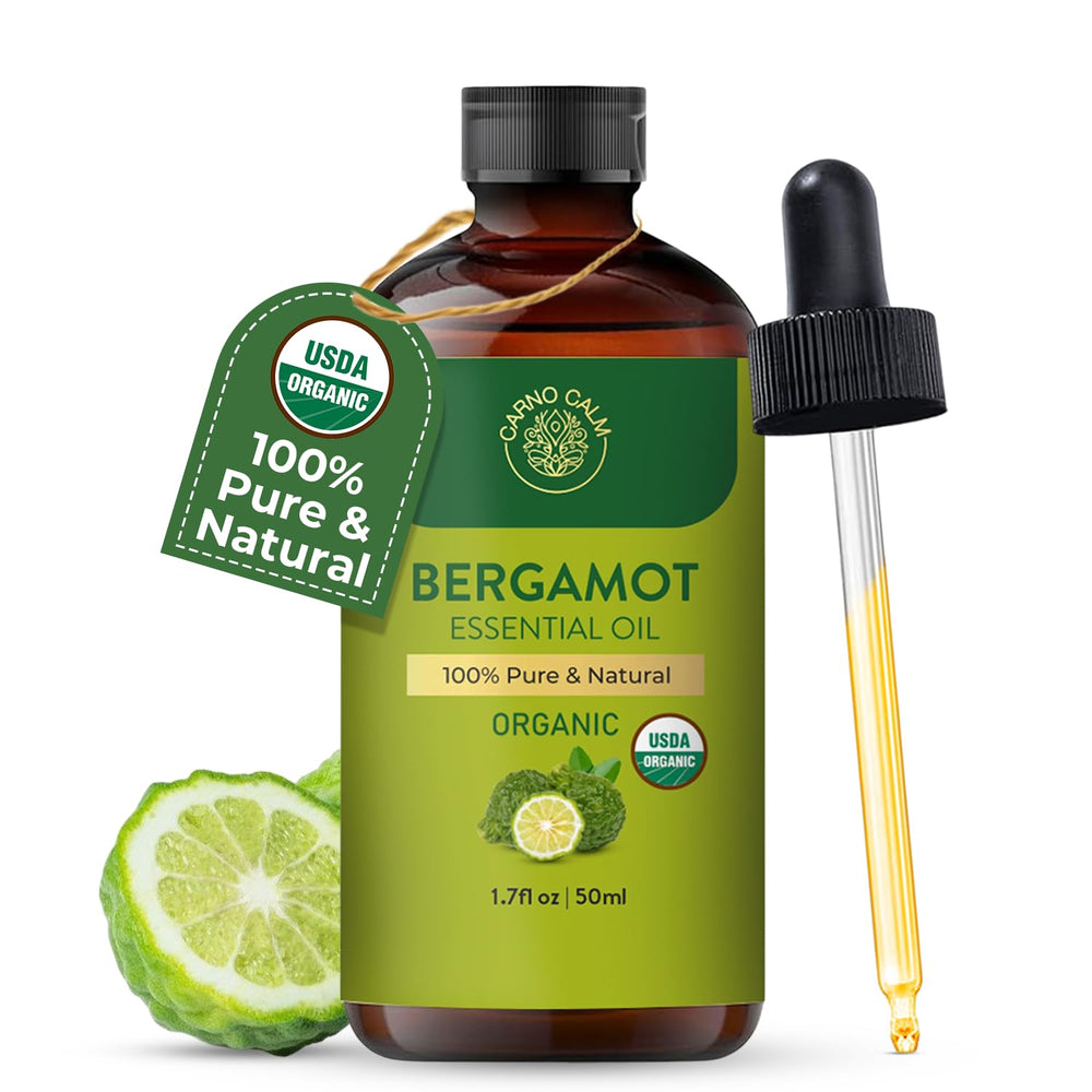Bergamot essential oil close-up with bottle and label