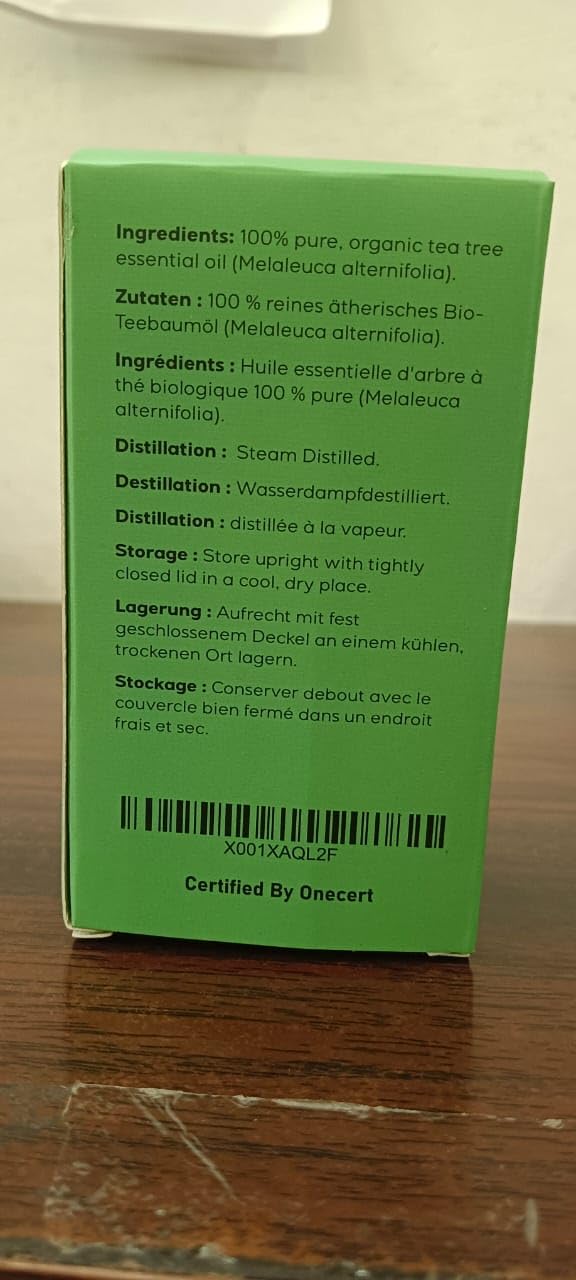 Diffuser with tea tree oil drops creating calming atmosphere