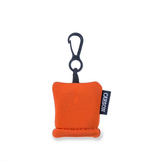 Close-up of orange Stuff-It microfiber cloth and pouch