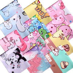 Flat lay of cartoon color microfiber cleaning cloths for glasses and lenses