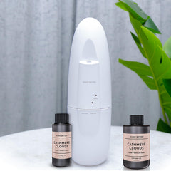 Gift-ready Cashmere Clouds packaging with bottle