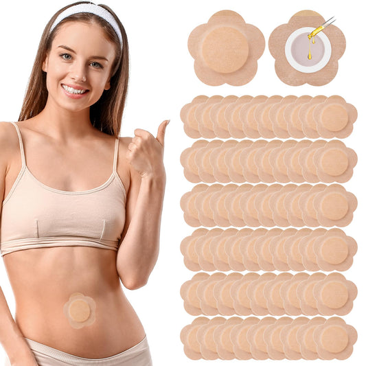 60-piece brown castor oil patches laid out on white background