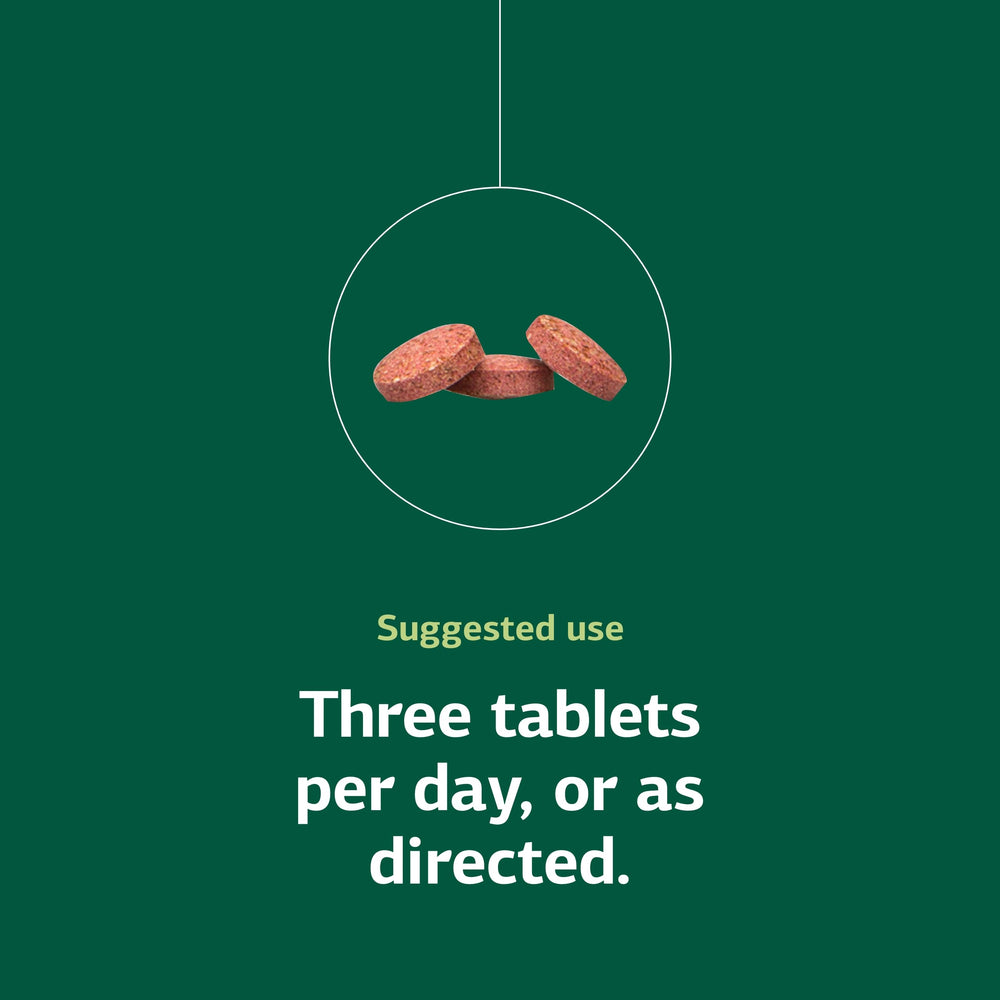 Chewable tablet with water illustrating daily use