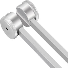 CBCJIEHUXL tuning fork placed on body for vibration-based relaxation.