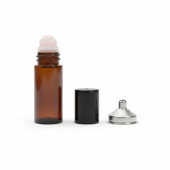 Cchenxxi amber glass roll-on bottle with jade roller ball for smooth fragrance application and UV protection.