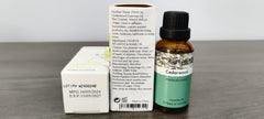 Close-up of cedarwood essential oil bottle label