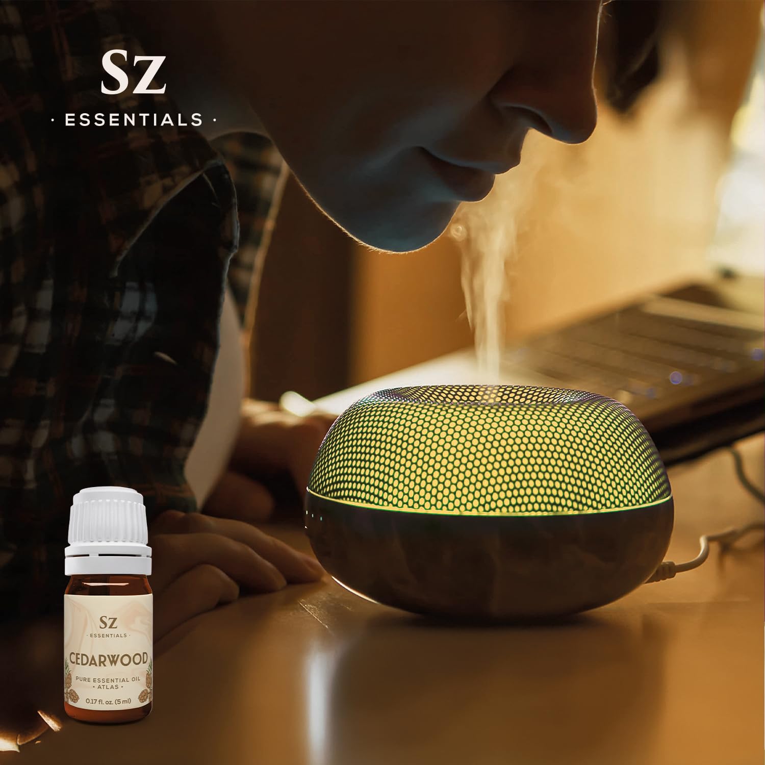 Cedarwood essential oil used in skincare application.