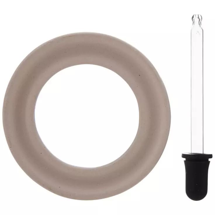 Close-up of ceramic aroma ring and included dropper