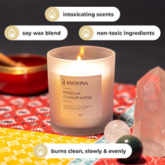 Brown glass jar candle with pink-toned label - side view
