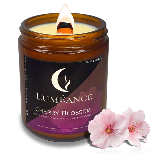 Close-up of cherry blossom candle with crackling wood wick