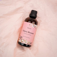 Packaging and 100ml bottle of Cherry Blossom Essential Oil