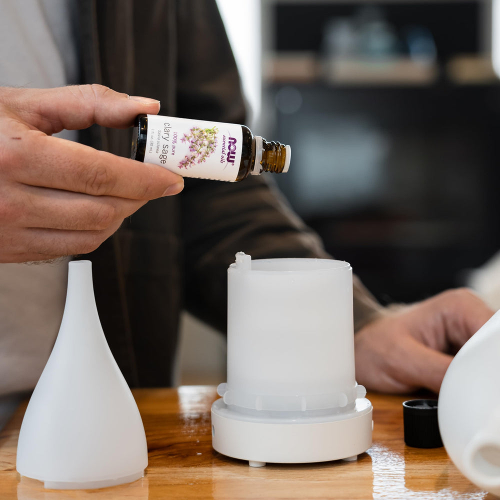 Bottle with child-resistant cap for clary sage oil