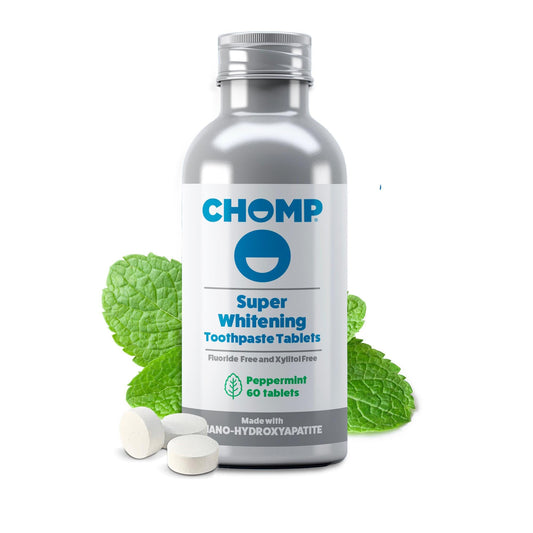 Chomp toothpaste tablets bottle and tablets with Nano Hydroxyapatite