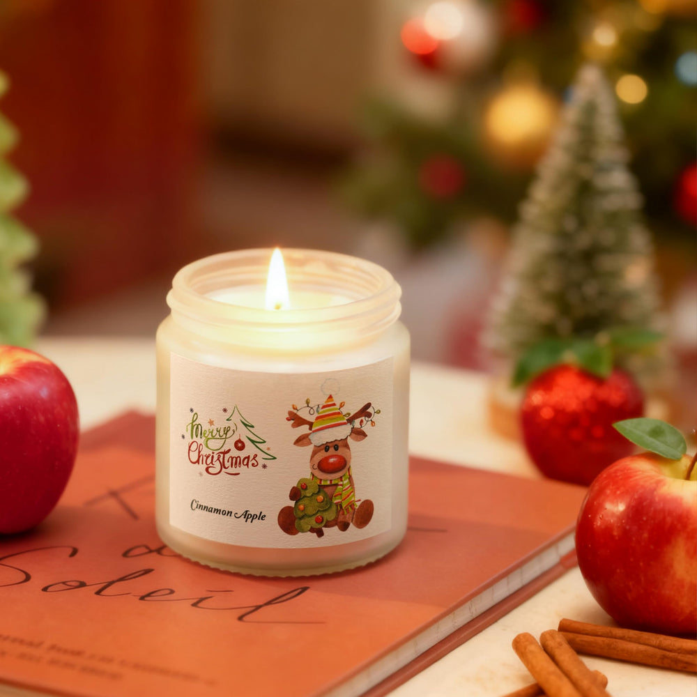 Holiday Fire scented candle in a frosted glass jar