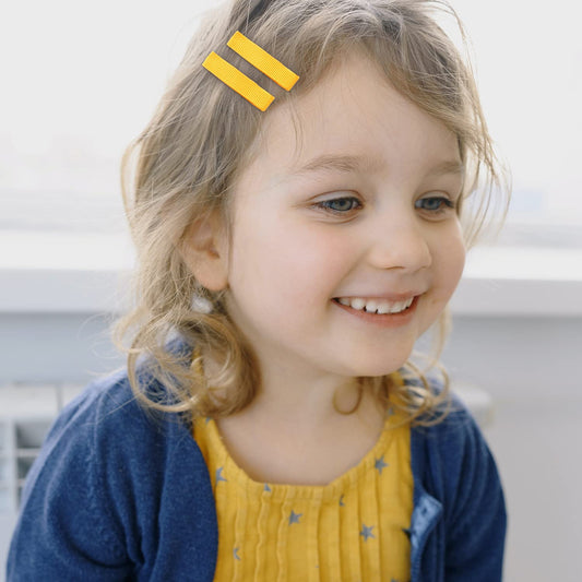 Cinaci solid color clips showing 30 hues for versatile styling