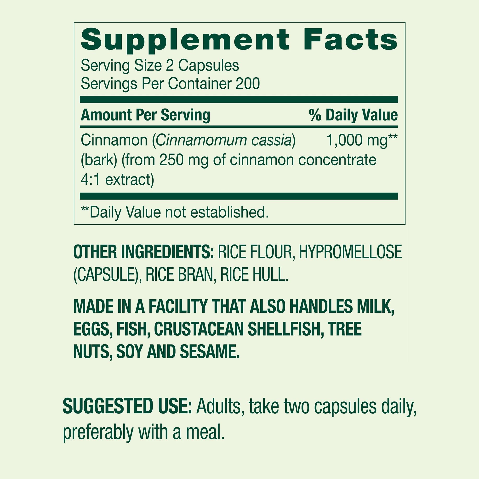Back view of Cinnamon 1000 mg bottle showing dosage and certifications