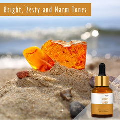 Close-up of amber-toned fragrance oil in glass bottle