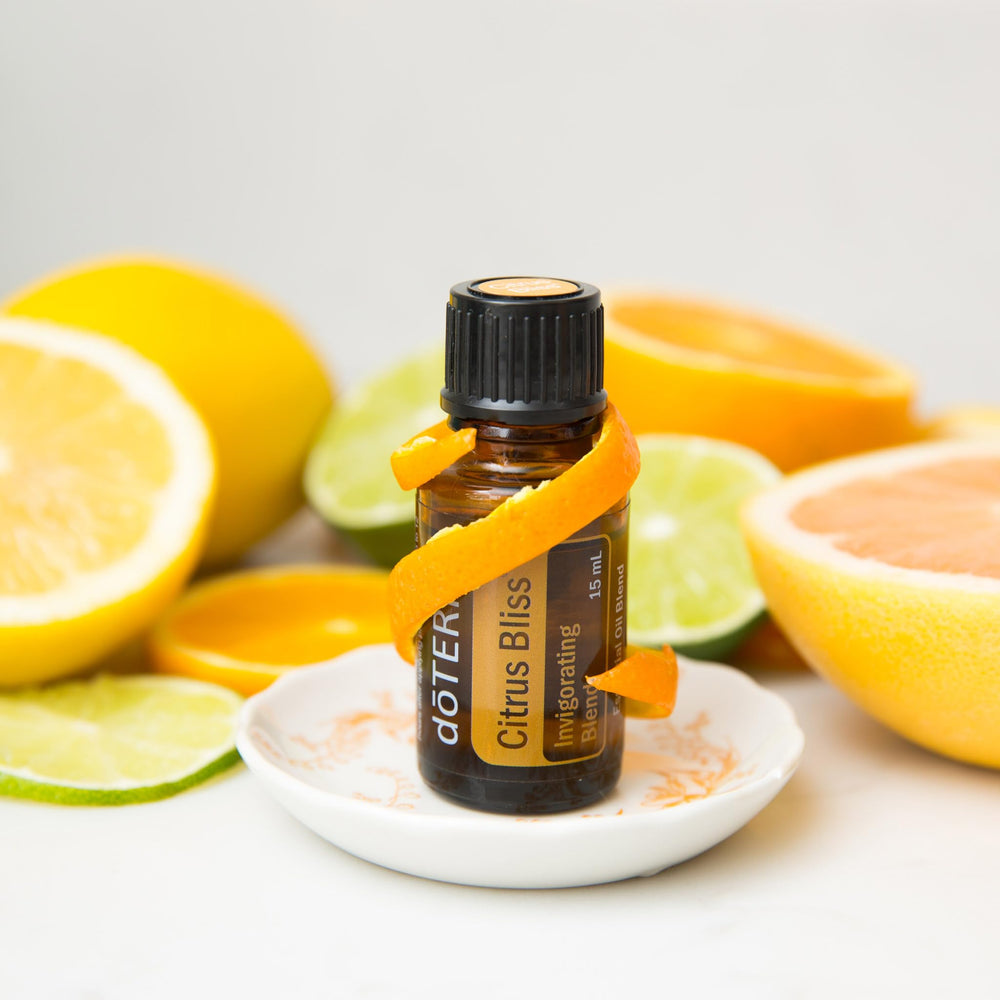 Ingredients and aroma notes of Citrus Bliss blend featuring Wild Orange, Lemon, Grapefruit, Mandarin, Bergamot, Tangerine, Clementine, and vanilla
