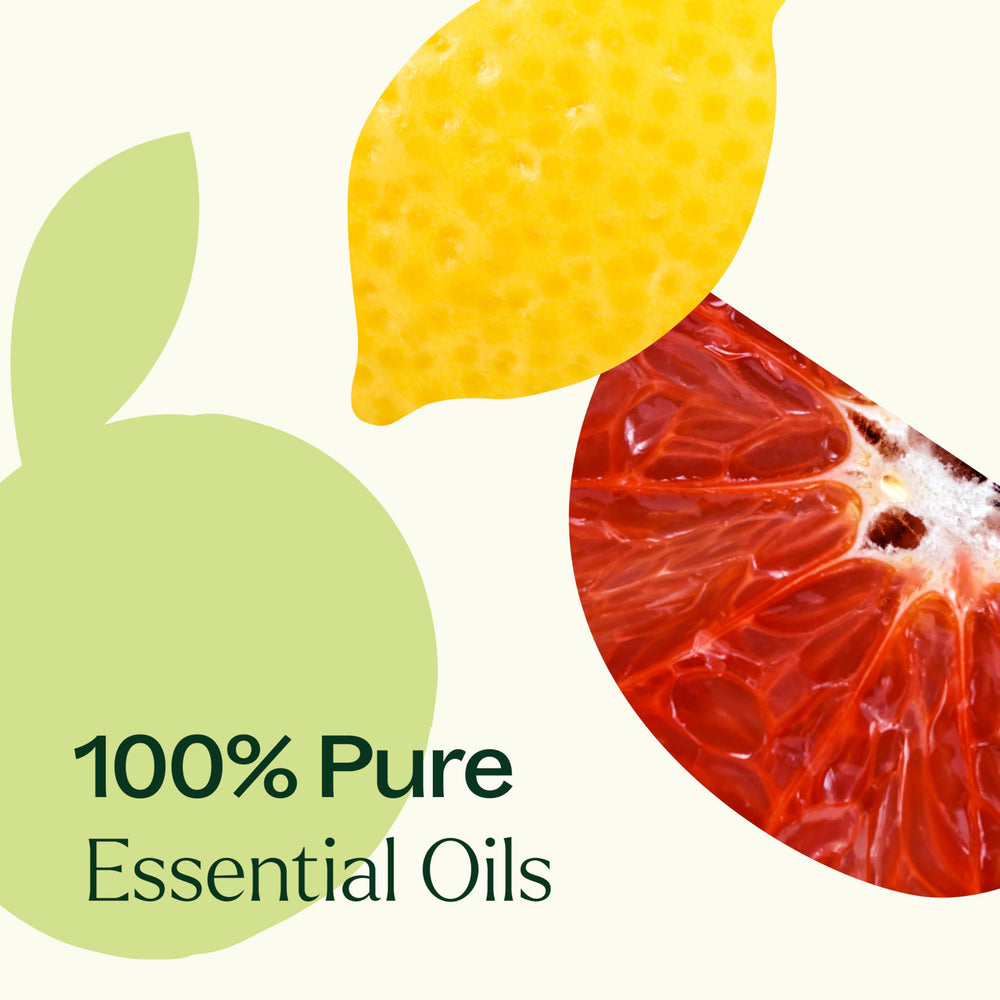 Citrus Burst bottle beside sliced pink grapefruit