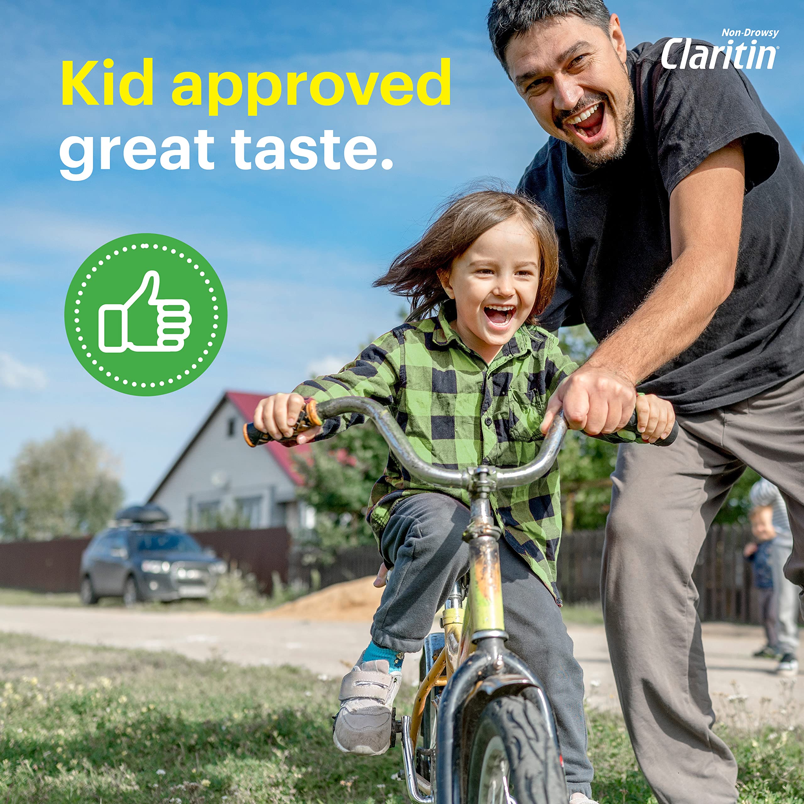 Claritin chewables grape kid-taking shot conveys simple administration during daily routines.