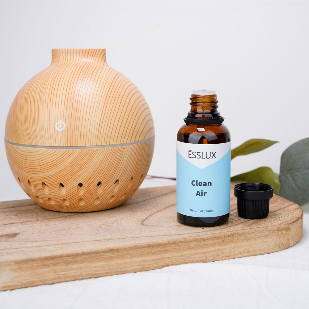 Home fragrance scene with ESSLUX Clean Air Diffuser