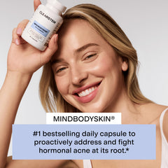 MINDBODYSKIN capsules in a scoop