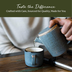 Cup of cleavers herbal tea setup