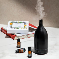 Clear glass bottle of Frankincense oil with label
