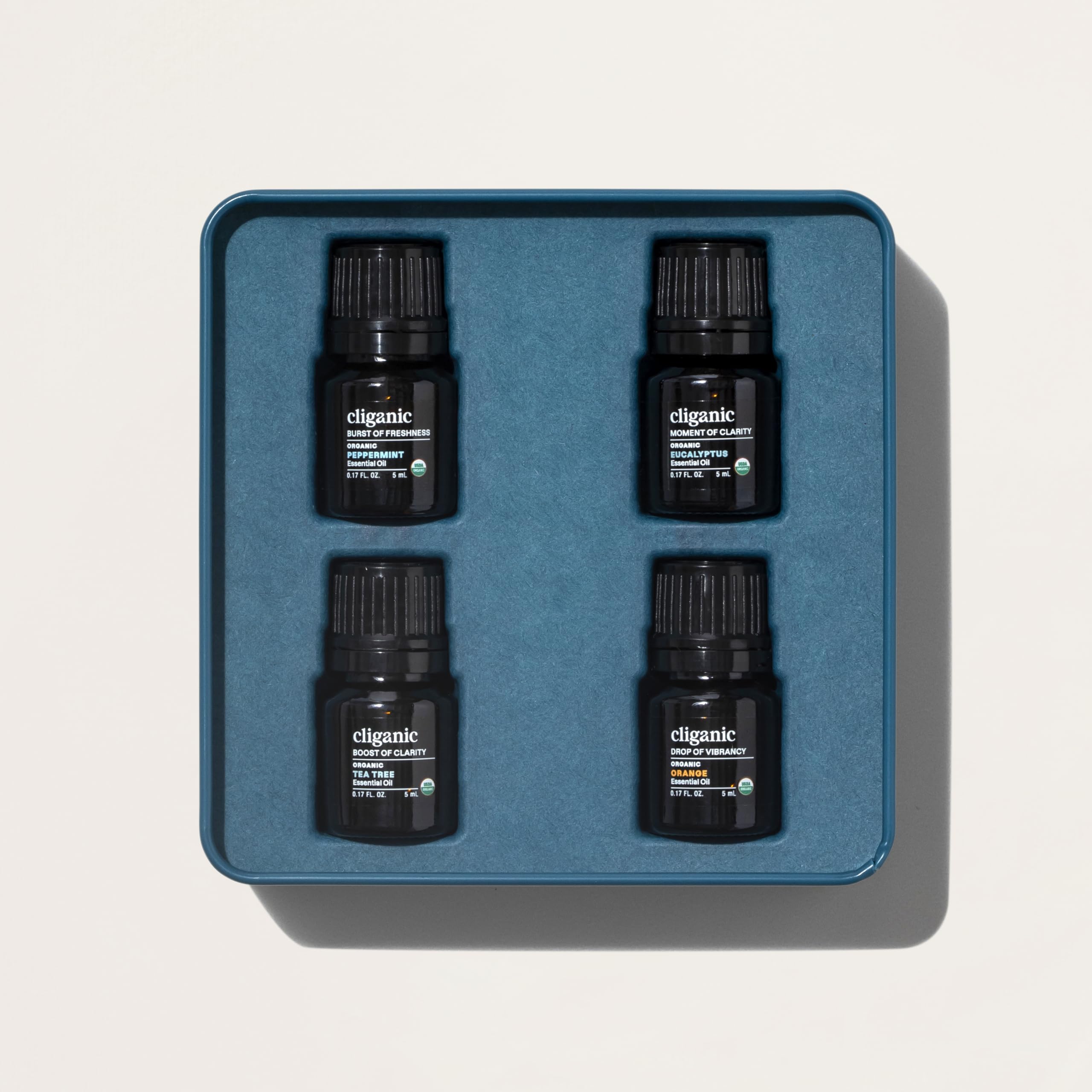 Tea tree essential oil bottle in Cliganic Gift Set.