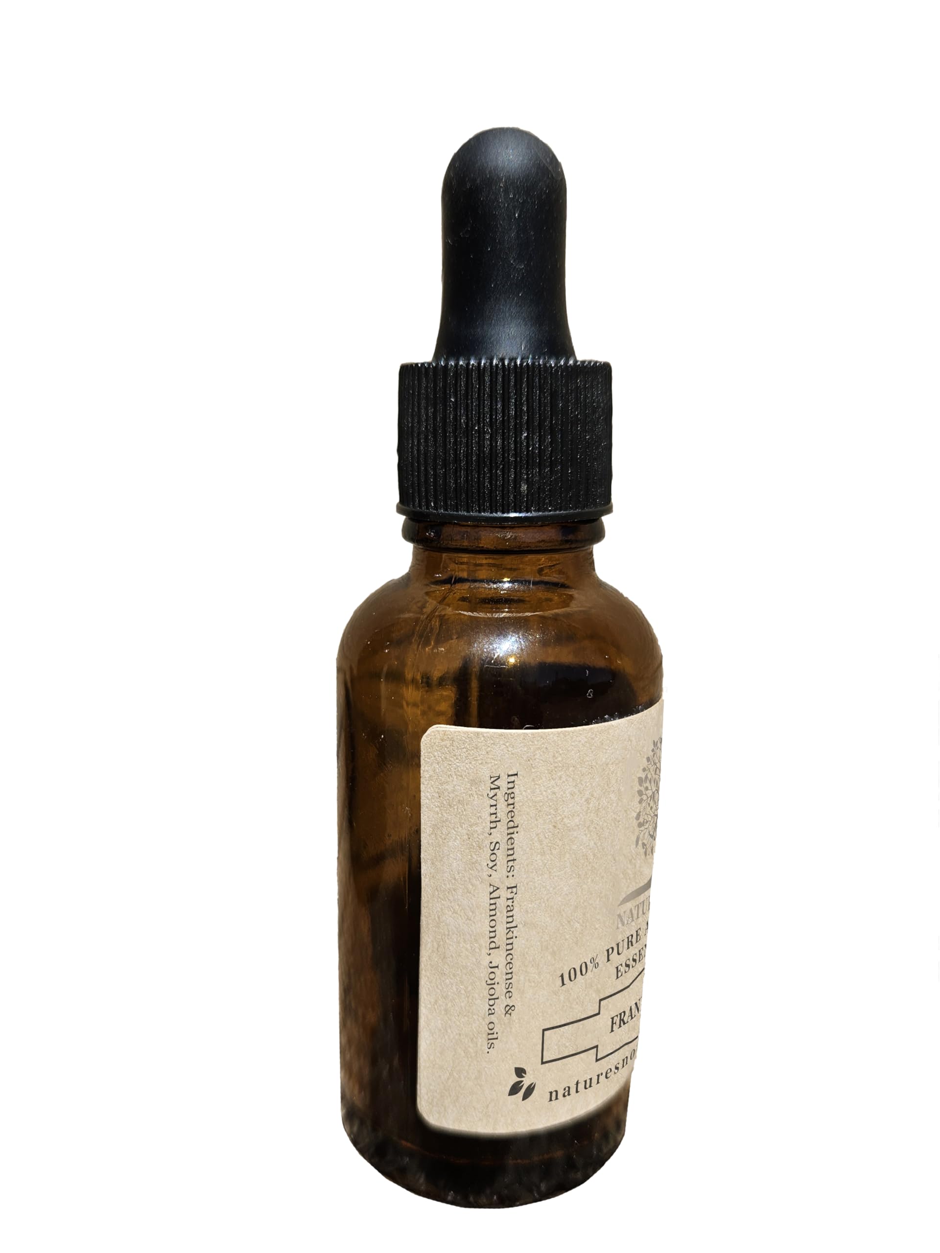 Close-up of the Frankincense & Myrrh essential oil bottle label.