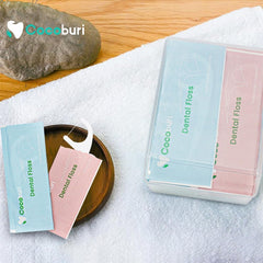 Individually wrapped floss picks in colorful packaging