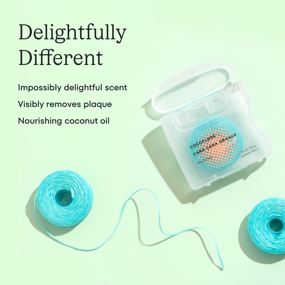 Coconut oil-infused waxed floss packaging close-up