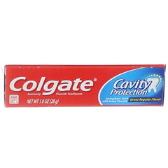 Travel-size Colgate fluoride toothpaste packaging, 1 oz, 8 tubes