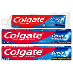 Colgate Cavity Protection toothpaste tube and box on white background