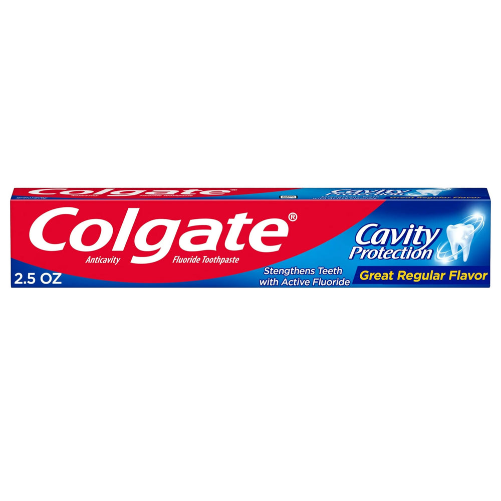 Close-up of Colgate toothpaste tube showing fluoride branding
