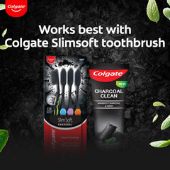 Toothpaste being squeezed onto toothbrush bristles