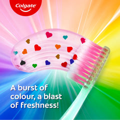 Person brushing teeth with Colgate MaxFresh Rainbow Fresh toothpaste