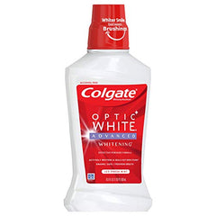 Colgate Optic White Mouthwash bottle held in hand