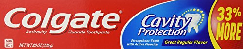 Back view showing ingredients and ADA seal on Colgate Cavity Protection toothpaste