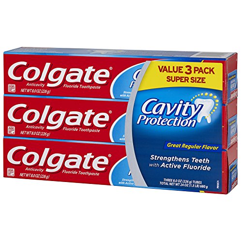 Close-up of active fluoride and label on Colgate toothpaste packaging