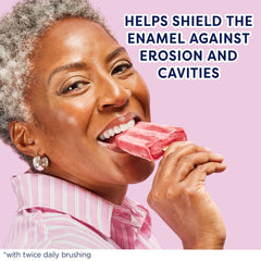 Close-up of Colgate Sensitive toothpaste paste on toothbrush