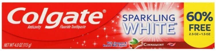Close-up of Colgate Sparkling White Cinnamint toothpaste packaging showing fluoride