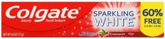 Close-up of Colgate Sparkling White Cinnamint toothpaste packaging showing fluoride