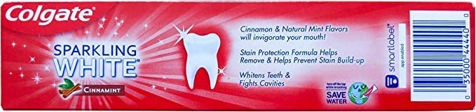 Whitening and stain protection imagery on Colgate toothpaste packaging