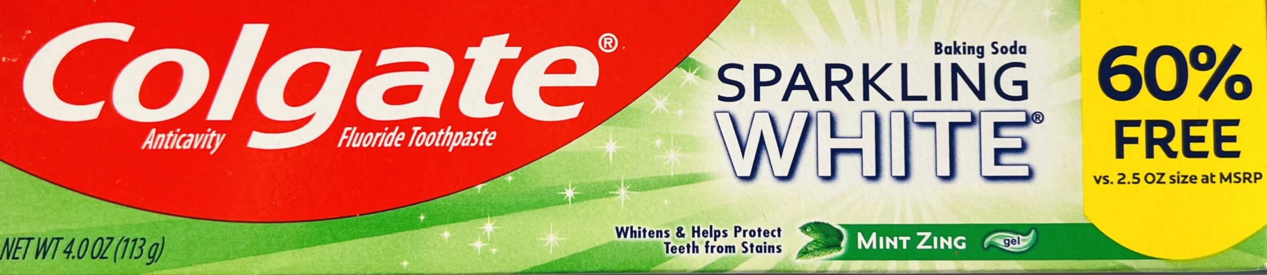 Close-up of Colgate Sparkling White Mint toothpaste tube