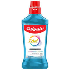 Colgate Total Peppermint Mouthwash paired with toothpaste and toothbrush